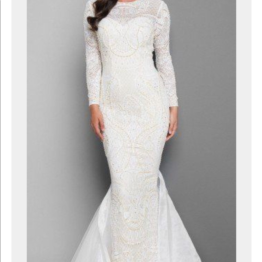 Two Terani couture ivory lace sleeved with beads